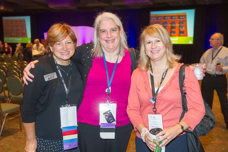 A group enjoying a hotel and club association event.